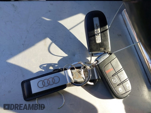2017 Jeep Grand Cherokee Trailhawk with VIN 1C4RJFLGXHC959092, listed as a IAAI auction lot 41232281 with 108,659 mi miles and . Bid and sale history available at DreamBid. Image 11.