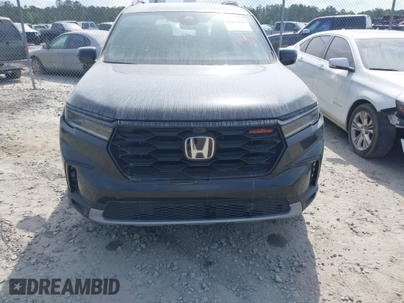2025 Honda Pilot TrailSport with VIN 5FNYG1H61SB026477, listed as a IAAI auction lot 41471719 with 12,624 mi miles and . Bid and sale history available at DreamBid. Image 12.