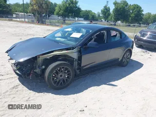 2024 Tesla Model 3 z VIN 5YJ3E1EA6RF747946, wystawiony jako IAAI lot #42042903 z przebiegiem 13 999 mil mil oraz . Historia ofert i sprzedaży dostępna na DreamBid. Obrazek 25.