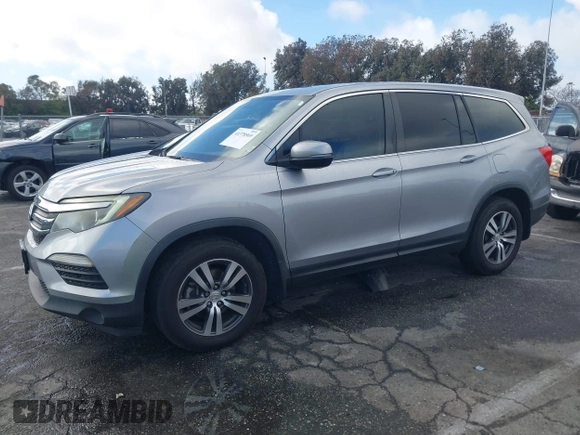 2016 Honda Pilot EX-L with VIN 5FNYF5H57GB038349, listed as a IAAI auction lot 41378569 with 117,651 mi miles and . Bid and sale history available at DreamBid. Image 14.