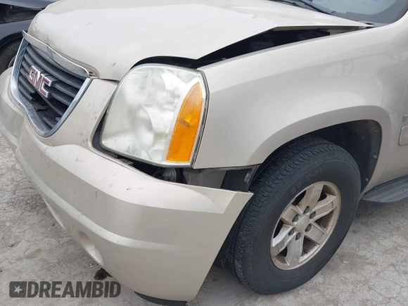2007 GMC Yukon XL SLT z VIN 1GKFC16097R280171, wystawiony jako IAAI lot #41319694 z przebiegiem 241 553 mil mil oraz . Historia ofert i sprzedaży dostępna na DreamBid. Obrazek 6.