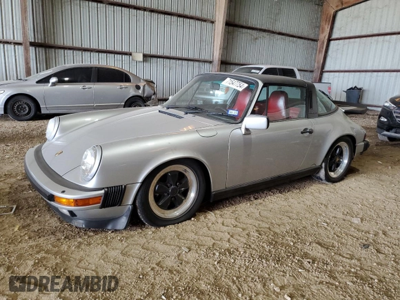 1988 Porsche 911 z VIN WP0EB0913JS161203, wystawiony jako Copart lot #71547754 z przebiegiem 109 128 mil mil oraz Szkoda całkowita • Salvage title. Historia ofert i sprzedaży dostępna na DreamBid. Obrazek 1.
