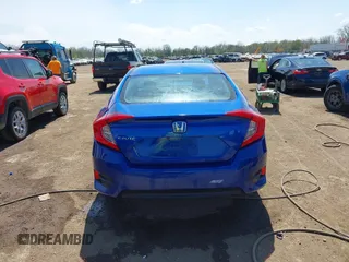 2018 Honda Civic LX with VIN 19XFC2F53JE020297, listed as a IAAI auction lot 42114807 with 124,058 mi miles and . Bid and sale history available at carsss.com. Image 16.