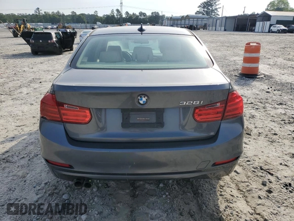 2014 BMW 3 Series 328i with VIN WBA3A5G50ENP33259, listed as a Copart auction lot 57330615 with 217,779 mi miles and Salvage title. Bid and sale history available at DreamBid. Image 6.