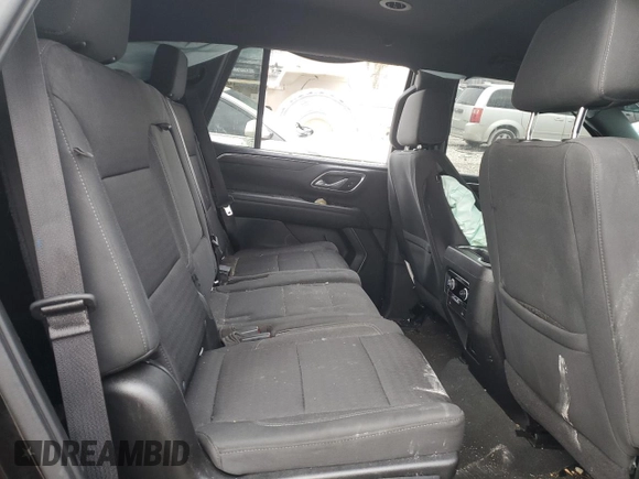 2021 Chevrolet Tahoe LS z VIN 1GNSKMKD8MR191699, wystawiony jako Copart lot #84043944 z przebiegiem Nie podano mil oraz Szkoda całkowita • Salvage title. Historia ofert i sprzedaży dostępna na DreamBid. Obrazek 11.