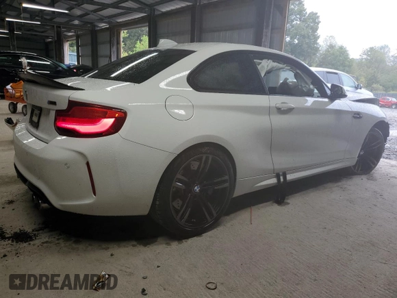 2018 BMW M2 z VIN WBS1J5C5XJVD37006, wystawiony jako Copart lot #71951884 z przebiegiem 52 530 mil mil oraz Szkoda całkowita • Salvage title. Historia ofert i sprzedaży dostępna na DreamBid. Obrazek 3.