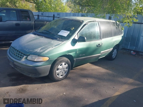 1999 Plymouth Voyager Grand SE z VIN 2P4GP44G1XR180660, wystawiony jako IAAI lot #42149571 z przebiegiem Nie podano mil oraz . Historia ofert i sprzedaży dostępna na DreamBid. Obrazek 2.