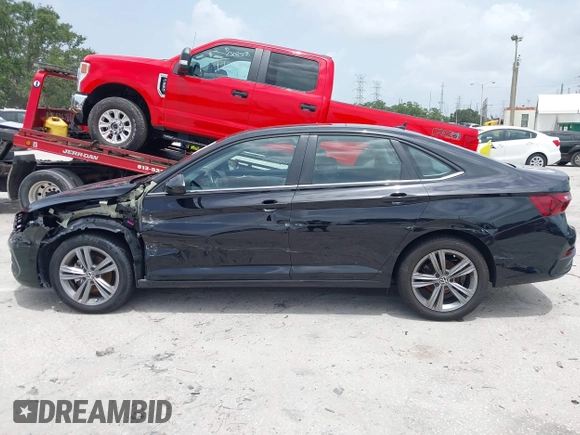 2023 Volkswagen Jetta SE with VIN 3VW7M7BU3PM037141, listed as a IAAI auction lot 42446046 with 21,149 mi miles and . Bid and sale history available at DreamBid. Image 14.