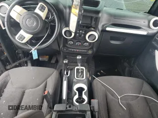 2017 Jeep Wrangler Unlimited Sport with VIN 1C4BJWDG7HL747010, listed as a Copart auction lot 64274405 with 61,602 mi miles and Salvage title. Bid and sale history available at DreamBid. Image 8.