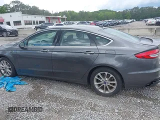2019 Ford Fusion Titanium with VIN 3FA6P0SU9KR126985, listed as a IAAI auction lot 42255509 with 138,779 mi miles and . Bid and sale history available at DreamBid. Image 14.