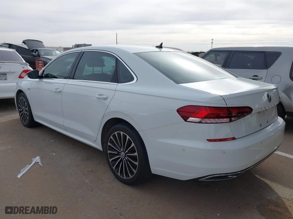 2022 Volkswagen Passat 2.0T Limited Edition with VIN 1VWBA7A32NC006523, listed as a IAAI auction lot 41263642 with 52,578 mi miles. Bid and sale history available at carsss.com. Image 3.