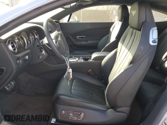 2013 Bentley Continental GT with VIN SCBFT7ZA1DC085265, listed as a Copart auction lot 76097134 with 14,756 mi miles and Salvage Title. Bid and sale history available at DreamBid. Image 7.