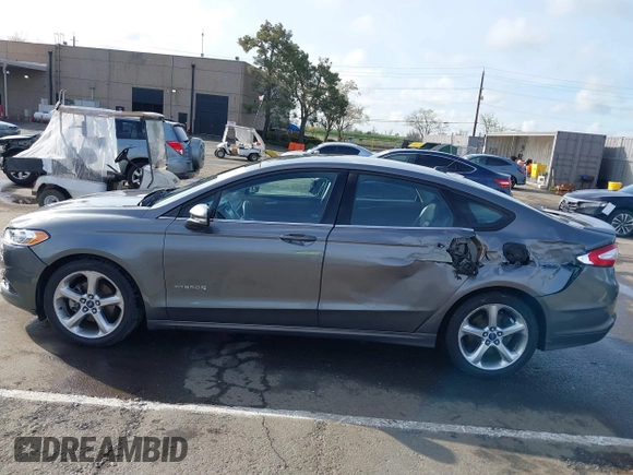 2013 Ford Fusion SE Hybrid with VIN 3FA6P0LU4DR267643, listed as a IAAI auction lot 41846681 with 148,002 mi miles. Bid and sale history available at carsss.com. Image 14.