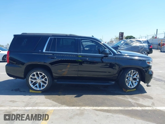2016 Chevrolet Tahoe LT z VIN 1GNSCBKC7GR311313, wystawiony jako IAAI lot #42303467 z przebiegiem 90 889 mil mil oraz . Historia ofert i sprzedaży dostępna na DreamBid. Obrazek 14.