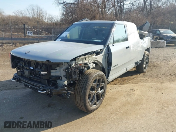 2025 Rivian R1T Adventure z VIN 7FCTGBAAXSN035740, wystawiony jako IAAI lot #41728515 z przebiegiem 3 773 mil mil oraz . Historia ofert i sprzedaży dostępna na DreamBid. Obrazek 6.