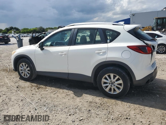 2014 Mazda CX-5 Sport with VIN JM3KE2BE9E0344990, listed as a Copart auction lot 59014145 with 126,905 mi miles and Salvage title. Bid and sale history available at DreamBid. Image 2.