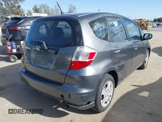2013 Honda Fit with VIN JHMGE8H36DC056640, listed as a IAAI auction lot 41969727 with 94,564 mi miles. Bid and sale history available at carsss.com. Image 4.