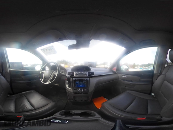 2014 Honda Odyssey Touring with VIN 5FNRL5H97EB127836, listed as a IAAI auction lot 41497413 with 174,914 mi miles and . Bid and sale history available at DreamBid. Image 18.