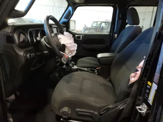 2022 Jeep Wrangler Unlimited Sport with VIN 1C4HJXDN9NW264238, listed as a Copart auction lot 87304774 with 33,217 mi miles and Salvage Title. Bid and sale history available at DreamBid. Image 7.
