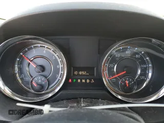 2015 Chrysler Town & Country LX with VIN 2C4RC1AG0FR730019, listed as a Copart auction lot 87692275 with 101,892 mi miles and Salvage Title. Bid and sale history available at carsss.com. Image 9.