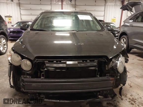 2015 Chevrolet Sonic LT with VIN 1G1JC5SH4F4163515, listed as a IAAI auction lot 41962147 with 133,104 mi miles and . Bid and sale history available at DreamBid. Image 13.