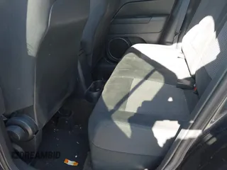 2014 Jeep Patriot Sport with VIN 1C4NJPBBXED911558, listed as a IAAI auction lot 42066449 with 107,208 mi miles. Bid and sale history available at carsss.com. Image 8.