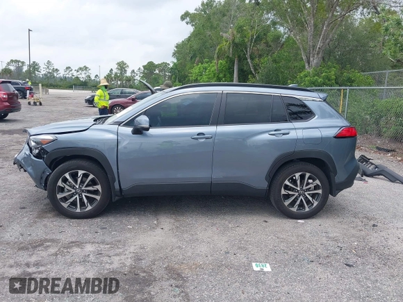2023 Toyota Corolla Cross XLE with VIN 7MUDAAAGXPV070263, listed as a IAAI auction lot 42394307 with 18,977 mi miles and . Bid and sale history available at DreamBid. Image 15.