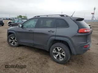 2015 Jeep Cherokee Trailhawk with VIN 1C4PJMBB6FW574108, listed as a Copart auction lot 57798475 with 105,022 mi miles and Salvage title. Bid and sale history available at DreamBid. Image 2.