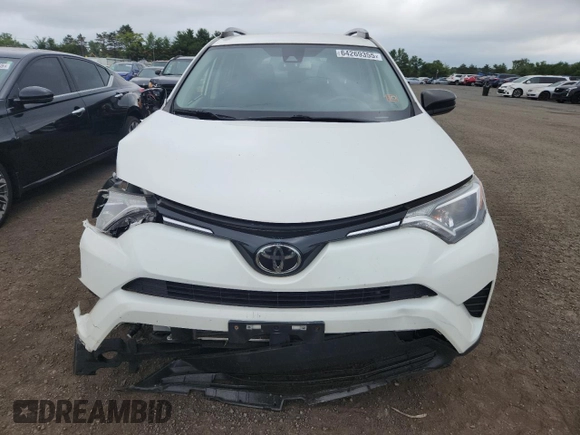 2017 Toyota RAV4 LE with VIN JTMBFREV3HJ136385, listed as a Copart auction lot 64269355 with 68,243 mi miles and Salvage title. Bid and sale history available at DreamBid. Image 5.