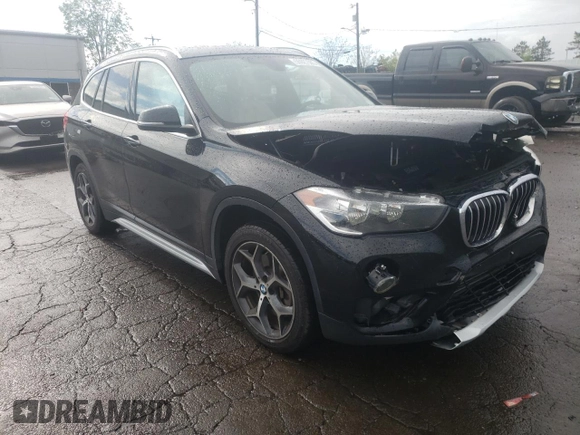 2018 BMW X1 xDrive28i with VIN WBXHT3C35J3H30946, listed as a Copart auction lot 55927505 with 69,626 mi miles and Salvage title. Bid and sale history available at DreamBid. Image 4.