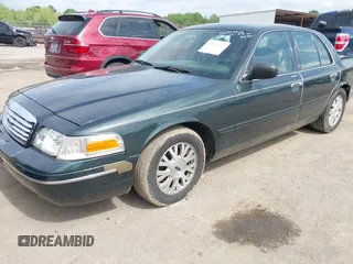 2003 Ford Crown Victoria LX z VIN 2FAFP74WX3X184730, wystawiony jako IAAI lot #42264132 z przebiegiem 297 561 mil mil oraz . Historia ofert i sprzedaży dostępna na DreamBid. Obrazek 2.