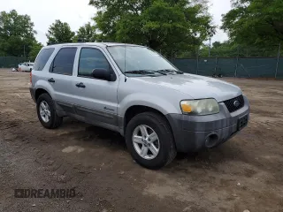 2005 Ford Escape Hybrid with VIN 1FMCU96H55KC74059, listed as a Copart auction lot 57065685 with 154,807 mi miles and Salvage title. Bid and sale history available at DreamBid. Image 4.