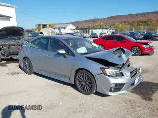 2016 Subaru WRX STI z VIN JF1VA2M66G9801668, wystawiony jako IAAI lot #40666254 z przebiegiem 80 686 mil mil oraz . Historia ofert i sprzedaży dostępna na DreamBid. Obrazek 1.