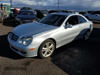 2007 Mercedes-Benz CLK-Class 3.5L with VIN WDBTJ56H87F220934, listed as a Copart auction lot 88152375 with 124,879 mi miles and Salvage Title. Bid and sale history available at carsss.com. Image 1.