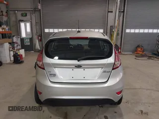 2016 Ford Fiesta SE with VIN 3FADP4EJ9GM197205, listed as a IAAI auction lot 41815313 with 115,689 mi miles. Bid and sale history available at carsss.com. Image 16.