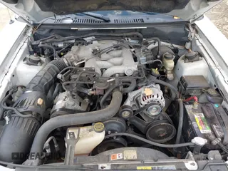 2004 Ford Mustang Deluxe z VIN 1FAFP44644F193077, wystawiony jako IAAI lot #42455984 z przebiegiem 138 265 mil mil oraz . Historia ofert i sprzedaży dostępna na DreamBid. Obrazek 10.