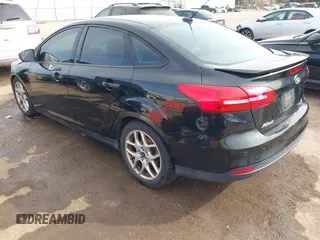 2015 Ford Focus SE with VIN 1FADP3F26FL356554, listed as a IAAI auction lot 41773139 with 143,911 mi miles. Bid and sale history available at carsss.com. Image 3.