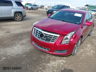 2013 Cadillac XTS with VIN 2G61N5S37D9177217, listed as a IAAI auction lot 41747566 with 140,946 mi miles. Bid and sale history available at carsss.com. Image 6.