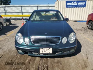 2003 Mercedes-Benz E-Class 3.2L with VIN WDBUF65J53A101021, listed as a Copart auction lot 73015774 with 242,812 mi miles and Clean Title. Bid and sale history available at carsss.com. Image 5.