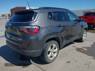 2018 Jeep Compass Altitude with VIN 3C4NJDBBXJT185252, listed as a IAAI auction lot 41847785 with 126,915 mi miles and . Bid and sale history available at carsss.com. Image 4.
