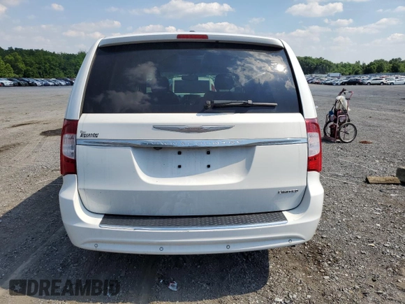 2014 Chrysler Town & Country Limited with VIN 2C4RC1GG7ER461197, listed as a Copart auction lot 59426574 with 96,068 mi miles and Salvage Title. Bid and sale history available at DreamBid. Image 6.