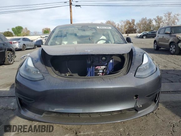 2023 Tesla Model 3 с VIN 5YJ3E1EA2PF644634, выставлен на аукционе Copart как лот 85637384 с пробегом 19 643 миль миль и Списание • Salvage title. История ставок и продаж доступна на DreamBid. Изображение 5.