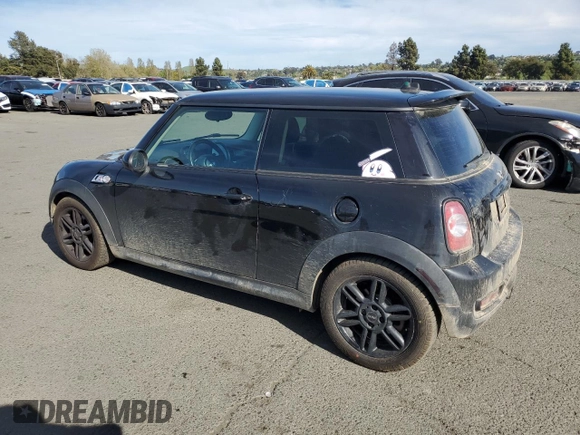 2012 MINI Hardtop S with VIN WMWSV3C54CT386098, listed as a Copart auction lot 52742075 with 119,432 mi miles and Salvage Title. Bid and sale history available at DreamBid. Image 2.