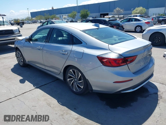 2019 Honda Insight Touring with VIN 19XZE4F93KE007489, listed as a IAAI auction lot 41943334 with 118,689 mi miles and . Bid and sale history available at DreamBid. Image 3.