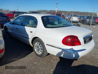 2002 Lincoln Continental with VIN 1LNHM97V92Y678663, listed as a IAAI auction lot 41777625 with 173,329 mi miles and . Bid and sale history available at DreamBid. Image 3.