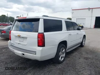 2015 Chevrolet Suburban LTZ with VIN 1GNSCKKC4FR239114, listed as a IAAI auction lot 42832146 with 183,711 mi miles and . Bid and sale history available at DreamBid. Image 4.