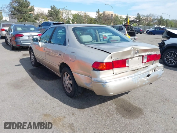 2000 Toyota Camry LE z VIN JT2BF22K5Y0258522, wystawiony jako IAAI lot #41998874 z przebiegiem 300 186 mil mil oraz . Historia ofert i sprzedaży dostępna na DreamBid. Obrazek 3.