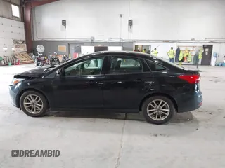 2018 Ford Focus SE with VIN 1FADP3FE8JL209560, listed as a IAAI auction lot 42707236 with 166,017 mi miles and . Bid and sale history available at DreamBid. Image 14.