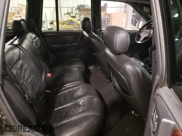 1998 Jeep Grand Cherokee Limited with VIN 1J4GZ88Z3WC165659, listed as a Copart auction lot 87527255 with 203,860 mi miles and Salvage Title. Bid and sale history available at carsss.com. Image 11.
