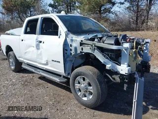 2023 Ram 2500 Big Horn with VIN 3C6UR5DL0PG611149, listed as a IAAI auction lot 41830205 with 58,997 mi miles. Bid and sale history available at carsss.com. Image 1.